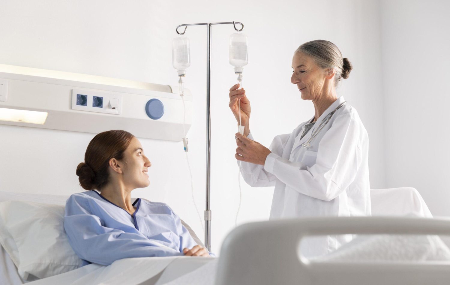 Female doctor checking female patient